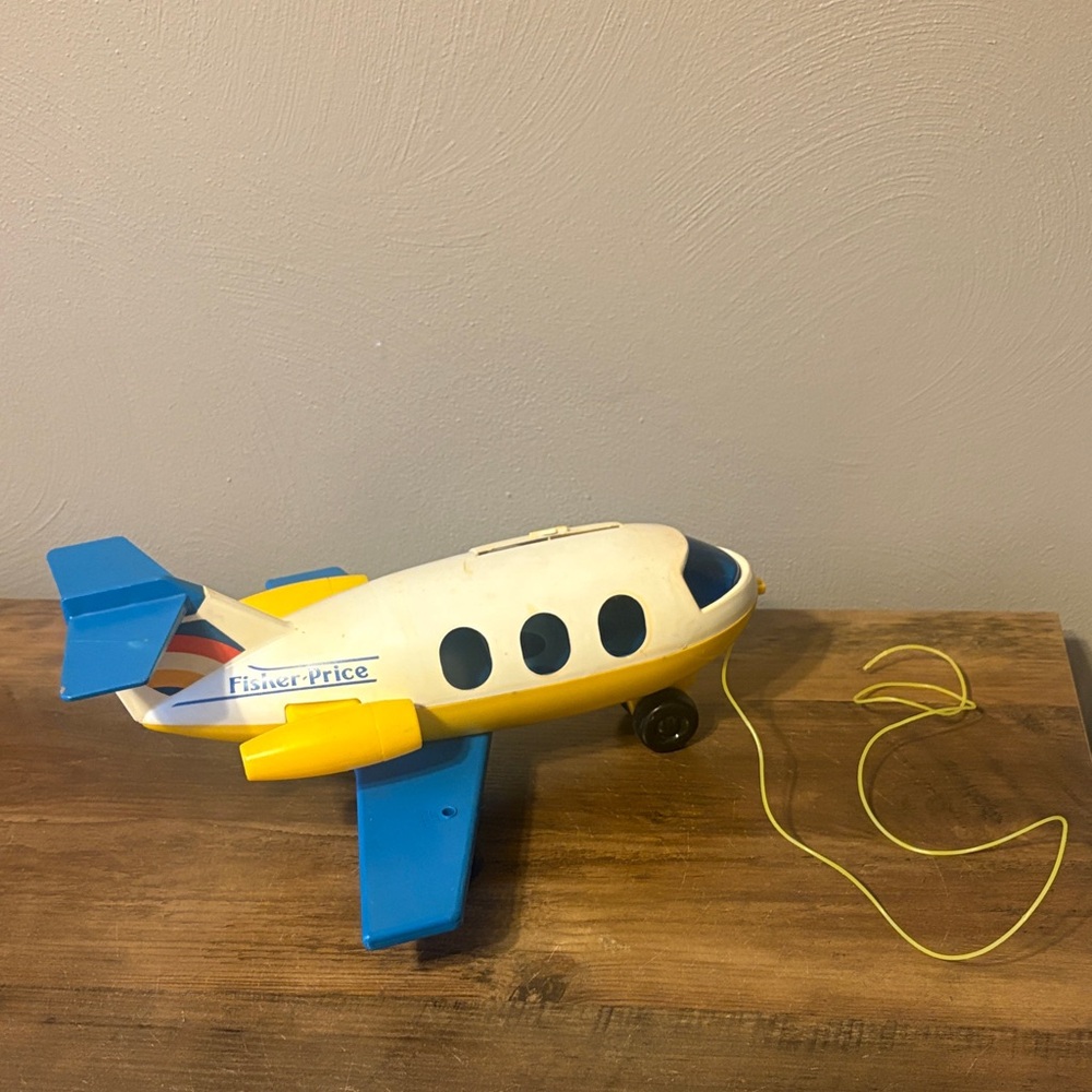 Fisher-Price Vintage Blue and Yellow Pull-Along Plane